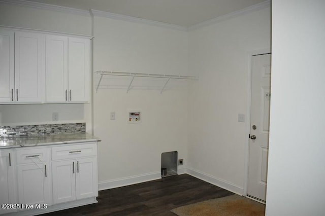 laundry area with cabinets, washer hookup, electric dryer hookup, crown molding, and dark hardwood / wood-style floors