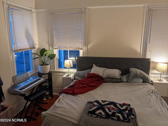 bedroom featuring hardwood / wood-style flooring