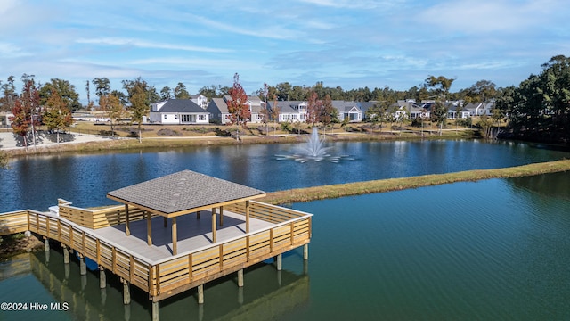 dock area featuring a gazebo and a water view