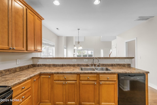 kitchen with black appliances, sink, hanging light fixtures, a notable chandelier, and wood-type flooring