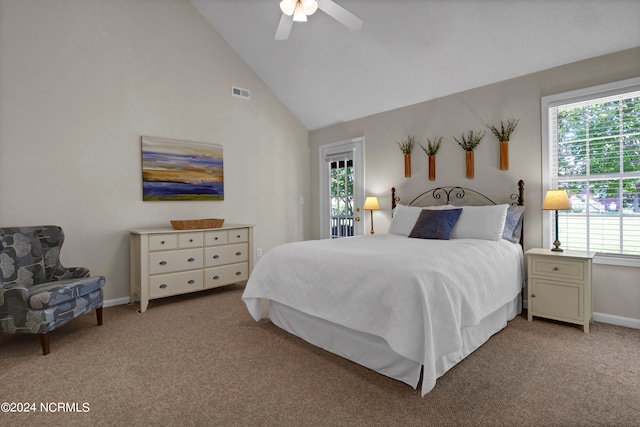 bedroom featuring ceiling fan, light colored carpet, and multiple windows