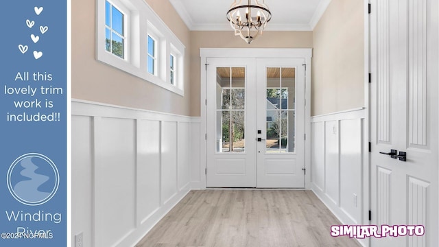 doorway featuring a chandelier, french doors, and a healthy amount of sunlight