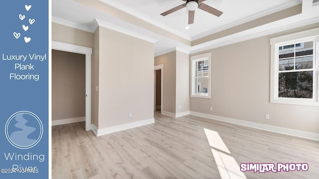 empty room featuring ceiling fan, light wood-type flooring, and ornamental molding