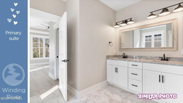 bathroom featuring vanity and ceiling fan