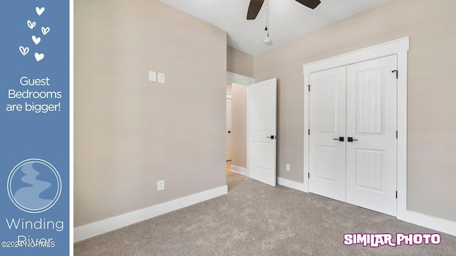 unfurnished bedroom featuring light colored carpet and ceiling fan