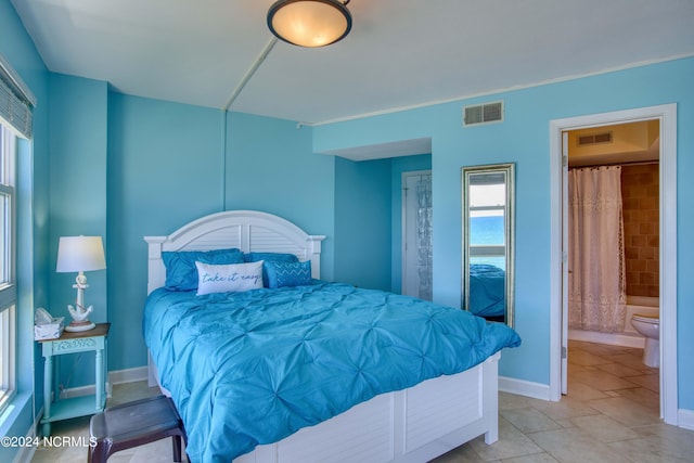 bedroom with connected bathroom