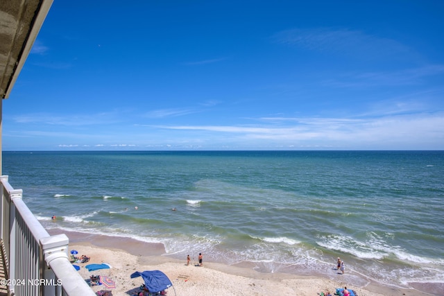 property view of water featuring a beach view