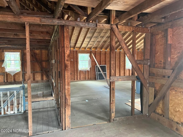 attic featuring a healthy amount of sunlight