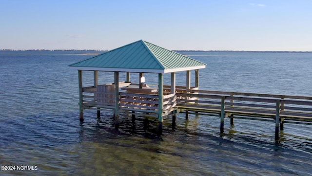 view of dock with a water view