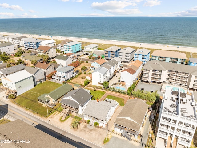 bird's eye view with a view of the beach and a water view