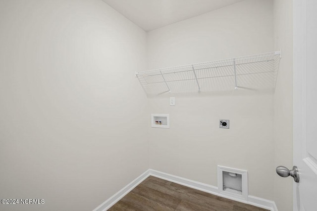 clothes washing area featuring dark hardwood / wood-style flooring, hookup for a washing machine, and hookup for an electric dryer