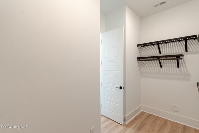 1105 Trisail Ter, Wilmington, NC 28412 - spacious closet featuring light wood-type flooring