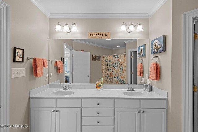 bathroom featuring walk in shower, vanity, and ornamental molding