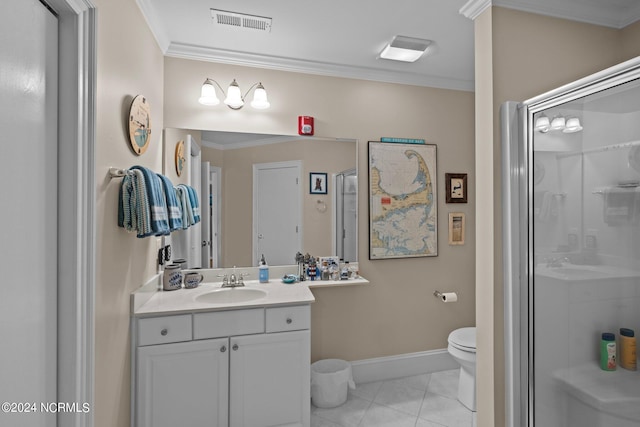 bathroom featuring tile patterned floors, vanity, toilet, and crown molding