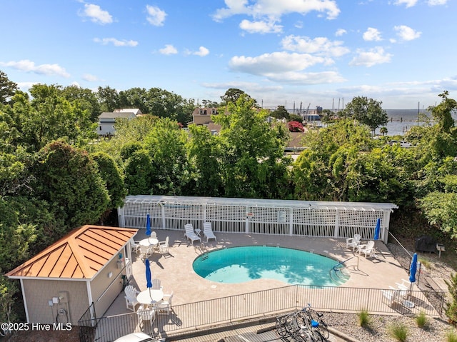 view of swimming pool featuring a patio