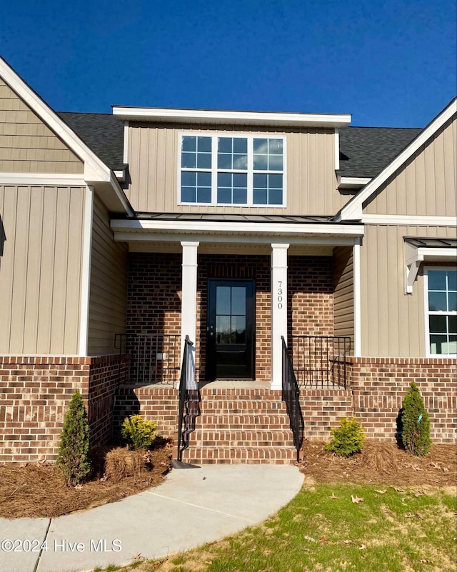 property entrance with a porch