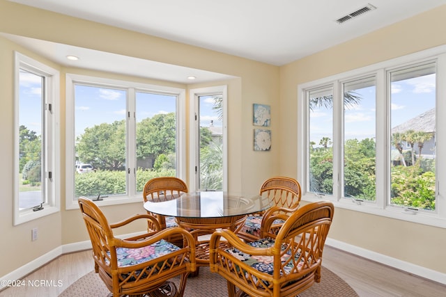 dining space featuring light hardwood / wood-style flooring