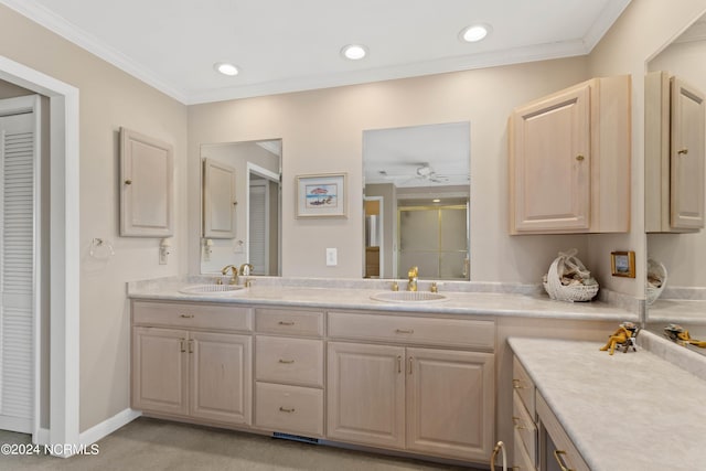 bathroom featuring ceiling fan, a shower with shower door, crown molding, and vanity