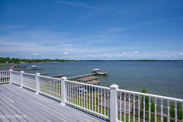 deck featuring a water view