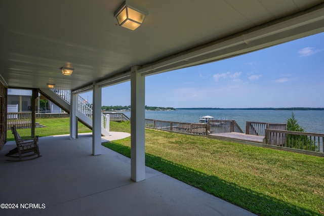 view of patio / terrace with a water view