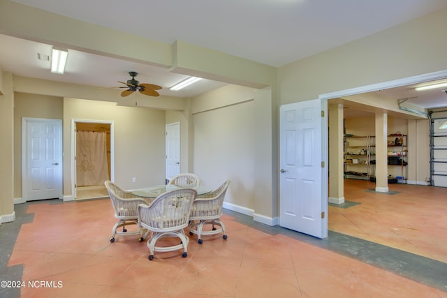 tiled dining area featuring ceiling fan