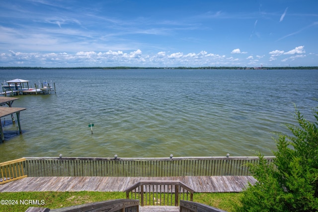 water view featuring a dock