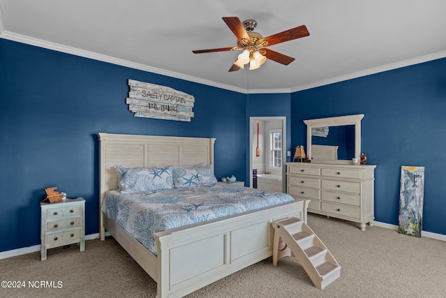 carpeted bedroom with ceiling fan and crown molding