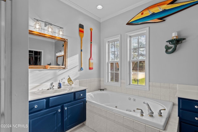 bathroom featuring crown molding, vanity, and a relaxing tiled tub