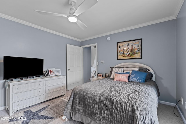 bedroom featuring ceiling fan, light colored carpet, and ornamental molding