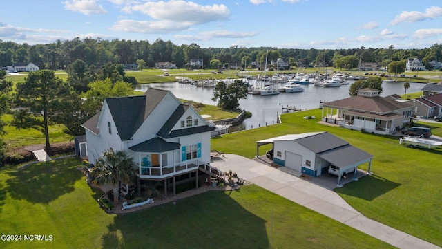 drone / aerial view with a water view