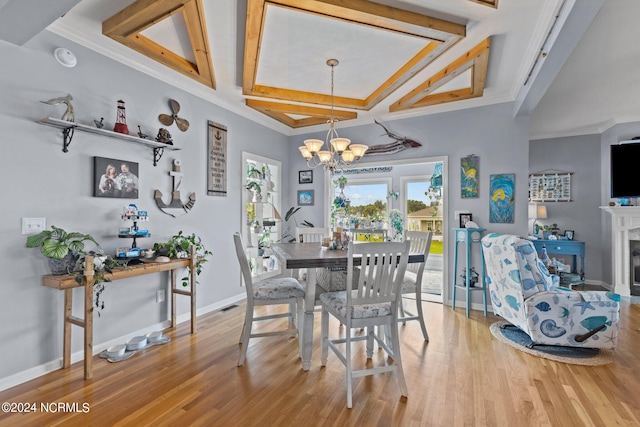 dining space with a chandelier, beamed ceiling, hardwood / wood-style flooring, and coffered ceiling