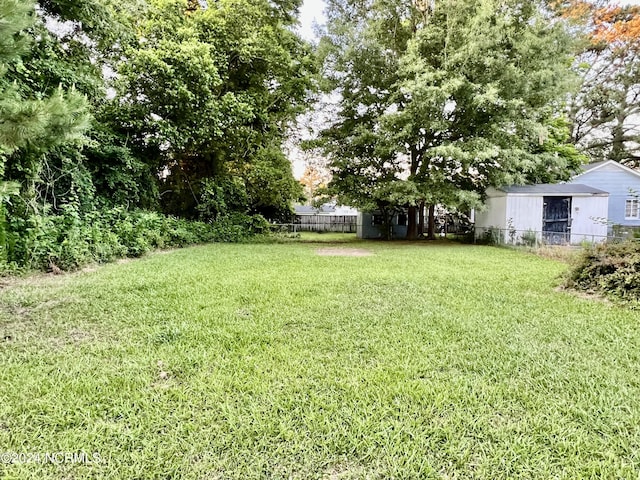 view of yard featuring fence