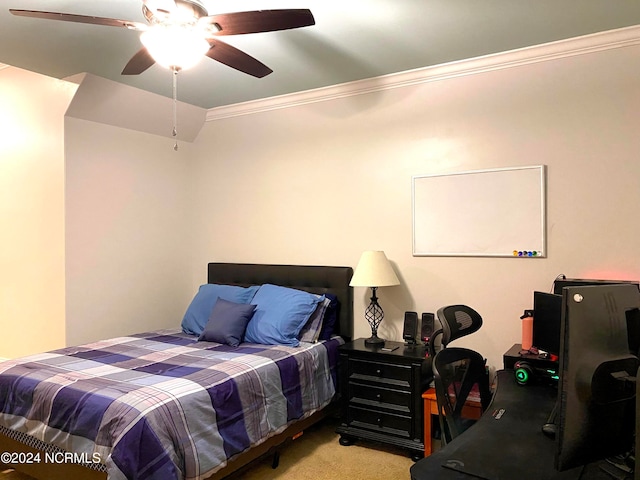 bedroom featuring crown molding, light carpet, and ceiling fan