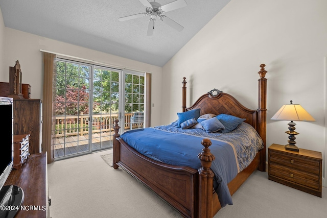 bedroom featuring vaulted ceiling, access to outside, light colored carpet, and a textured ceiling