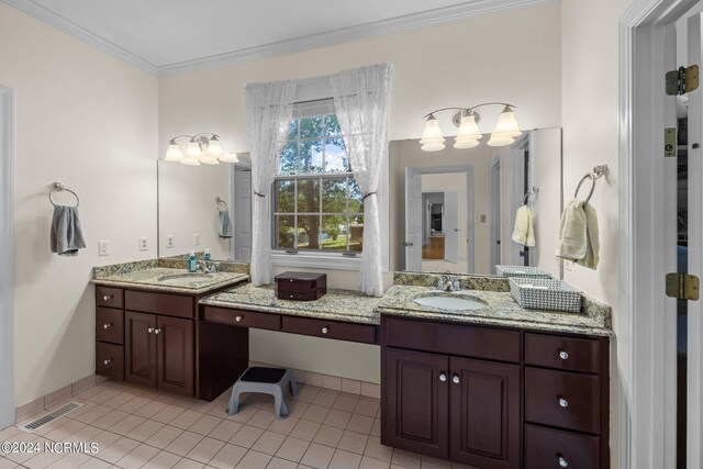 bathroom featuring tile floors, crown molding, and vanity