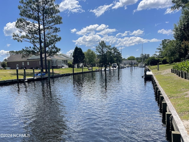 water view featuring a dock