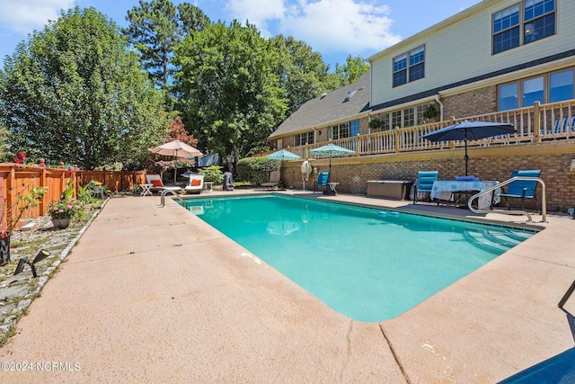 view of pool featuring a patio