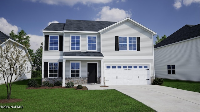 view of front of property with a garage and a front lawn