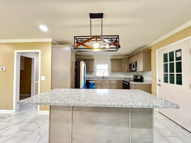 kitchen featuring appliances with stainless steel finishes, a kitchen island, hanging light fixtures, and sink