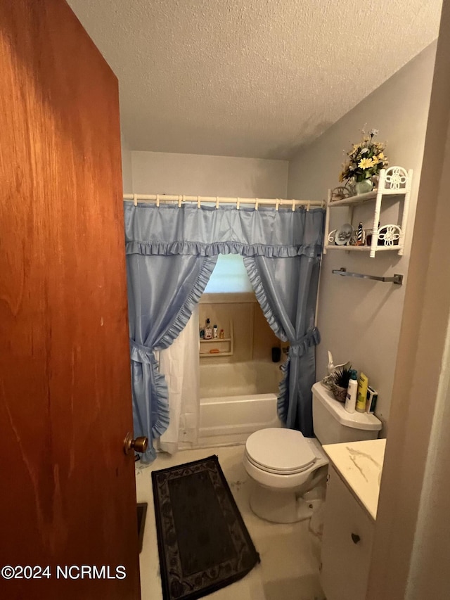 full bathroom with vanity, a textured ceiling, toilet, and shower / bathtub combination with curtain