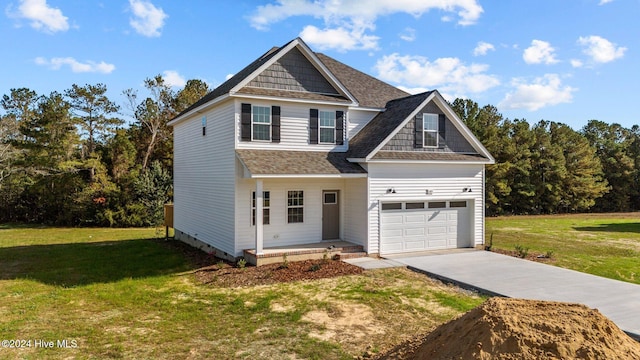 craftsman-style house with a front lawn and a garage