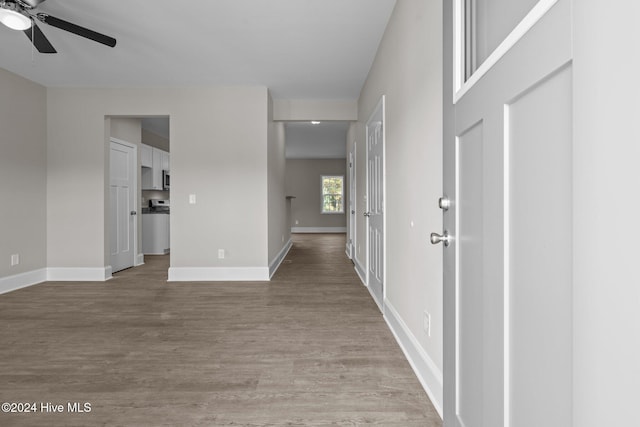 hall with light hardwood / wood-style flooring