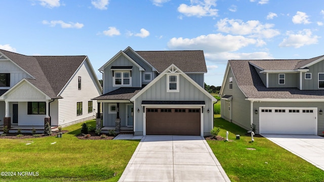 view of front of property featuring a garage and a front lawn