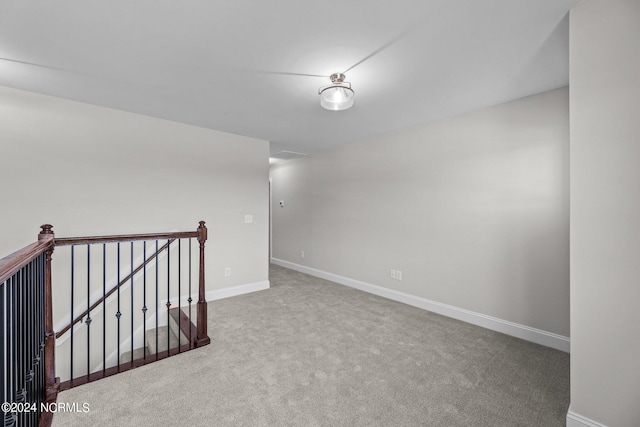 empty room featuring carpet flooring