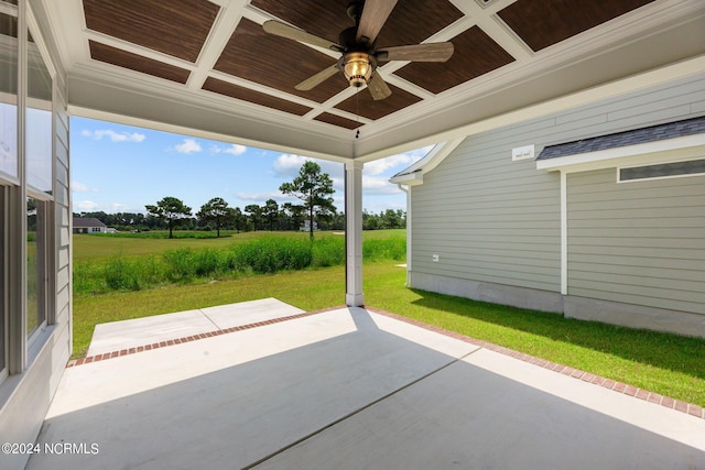 view of patio featuring ceiling fan