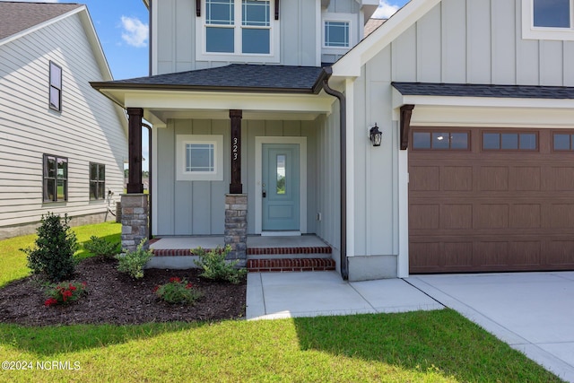 view of exterior entry featuring a porch