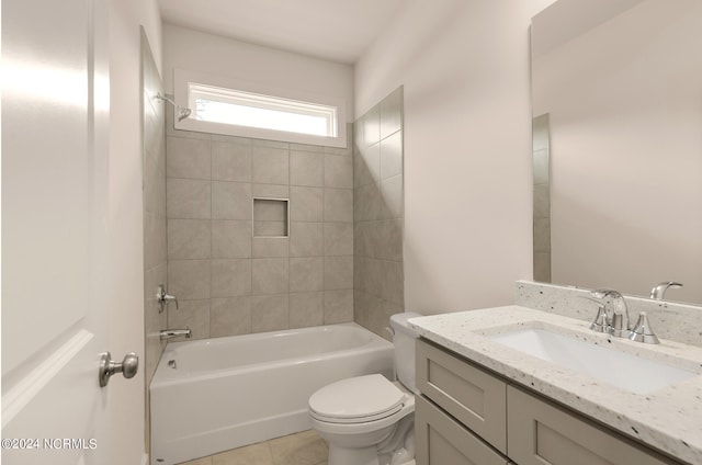 full bathroom with tiled shower / bath combo, vanity, tile patterned flooring, and toilet