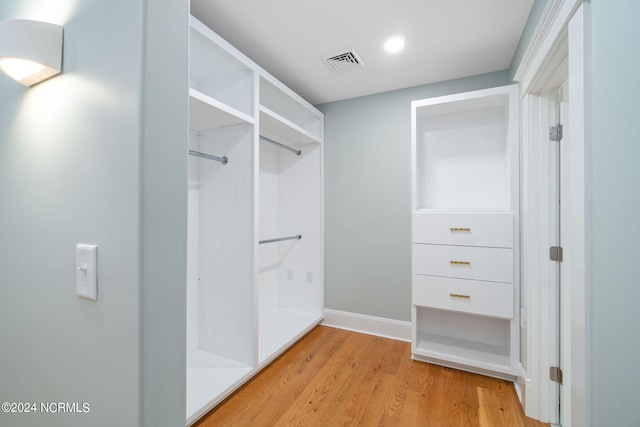 walk in closet featuring light wood-type flooring