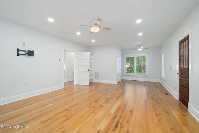 interior space featuring ceiling fan and light hardwood / wood-style floors