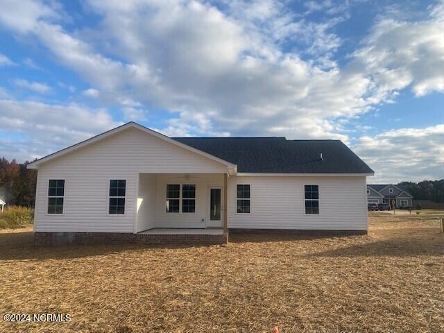 rear view of property with a patio area